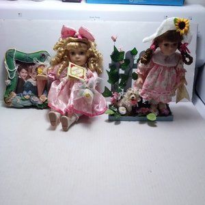 2 Collectors Choice Dolls--Girl w/ Picture Frame and Girl w/ Flowers
